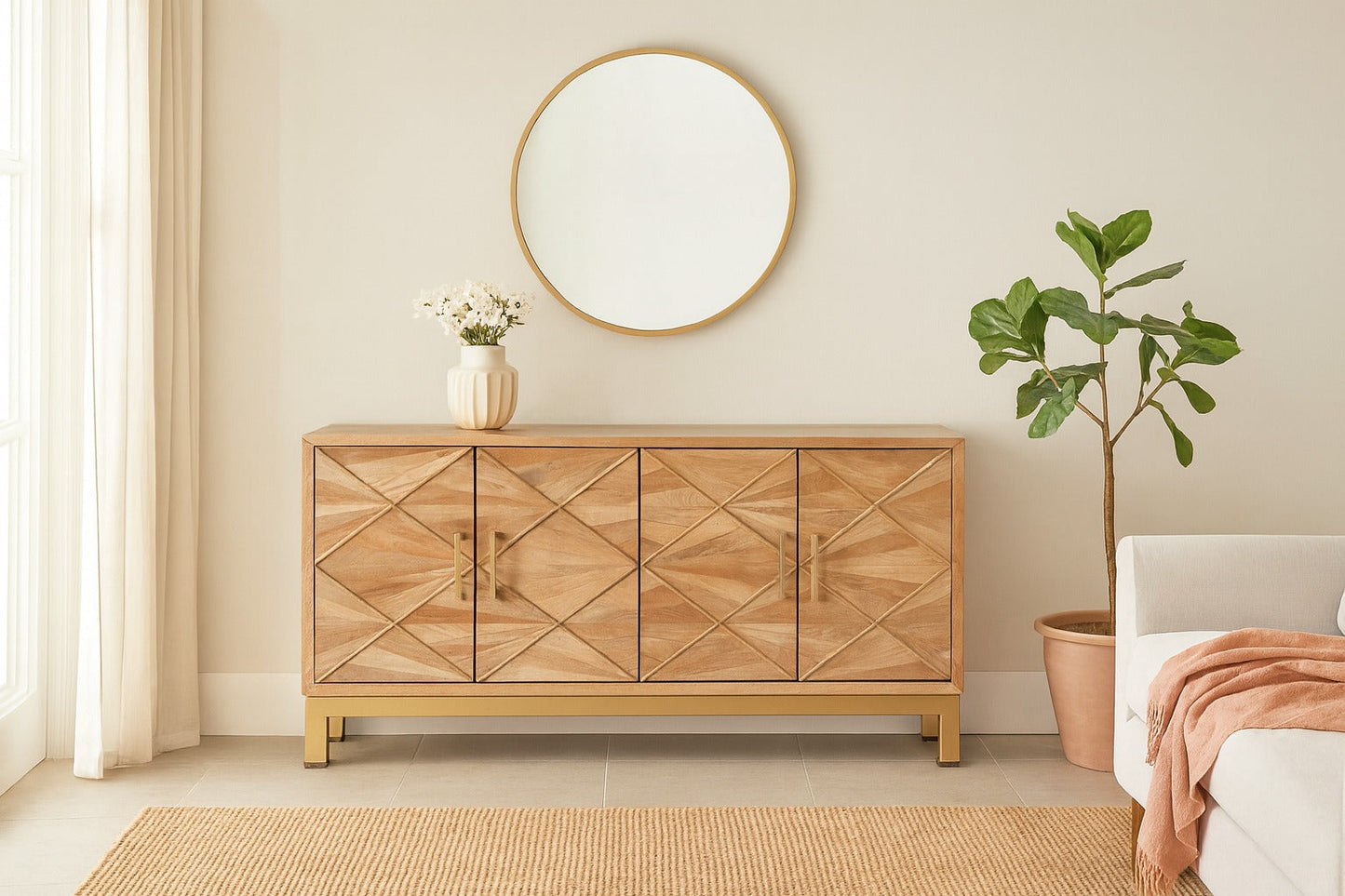 Wooden sideboard in a living room with a mirror, plant, and vase.