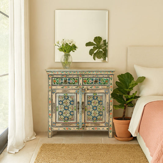 Decorative cabinet with floral patterns in a bedroom setting