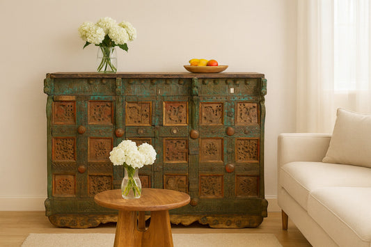 Vintage wooden cabinet with decorative patterns in a living room setting.
