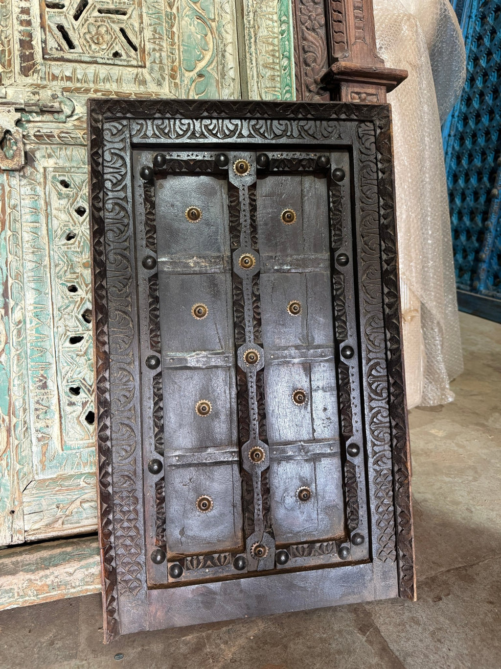 Kavira Hand-Carved Iron-Studded Wooden Wall Panel - DOBRI ARTS AU