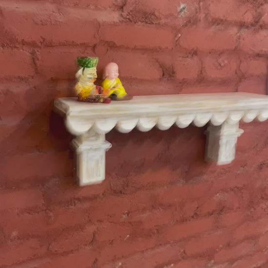 Vintage-inspired whitewashed carved wall shelves designed as decorative wall accents. These shelves, crafted from high-quality wood, are ideal for organizing books, displaying trinkets, or enhancing spaces like living rooms, kitchens, or bedrooms with a rustic, antique touch.