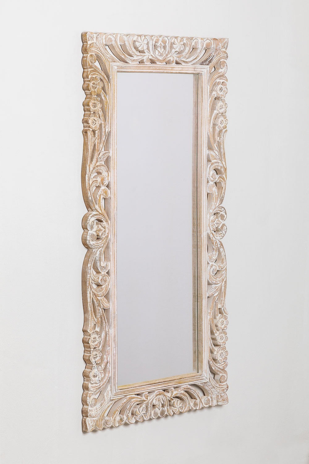 Black framed mirror with intricate Jharokha carvings, offering a bold statement piece for vintage wall decor or retro-style interiors."